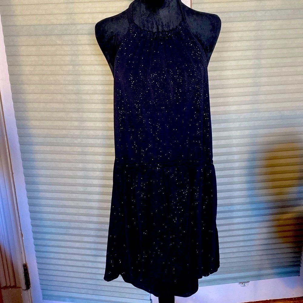 Sparkly halter top jumpsuit.‎